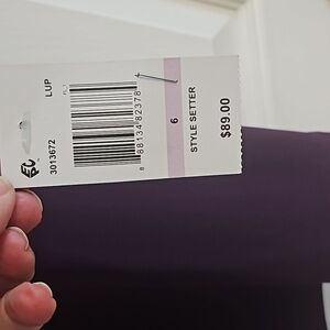 Formal dress with sparkly wrist detail.